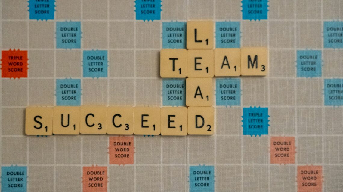 scrabbled scrabble tiles with words on them