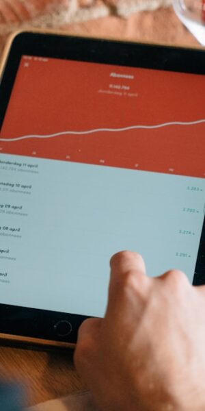 person using turned-on space gray iPad